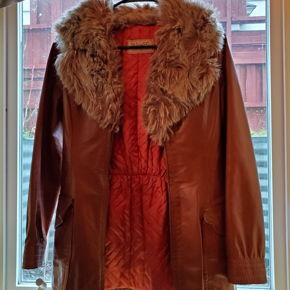 Vintage leather coat with faux fur collar